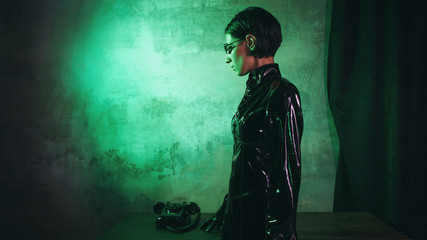 Young woman in matrix style suit, digital Internet technology and telecommunications, concept