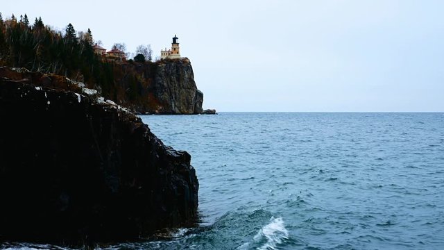 Waves break on shoreline at Split Rock Lighthouse on the north shore of Lake Superior near Duluth and Two Harbors, Minnesota.