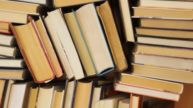old shabby books on the shelves