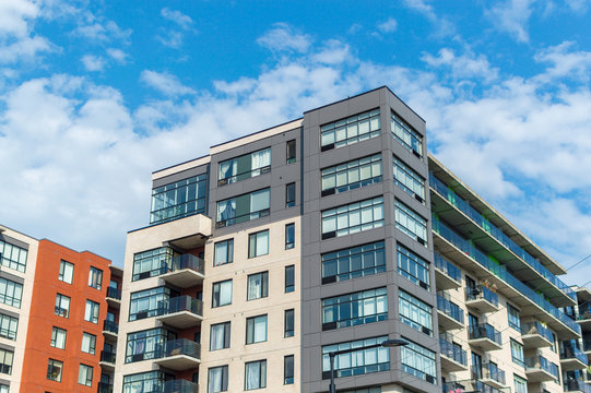 Modern condo buildings with huge windows in Montreal, Canada. 