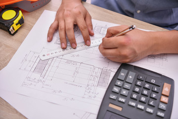 Engineering concept. The engineer is working in the office. Engineers are designing their work...