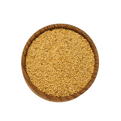 Wooden bowl with amaranth seeds isolated on white background.
