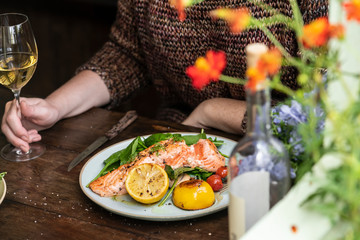 Grilled salmon filet with fresh greens