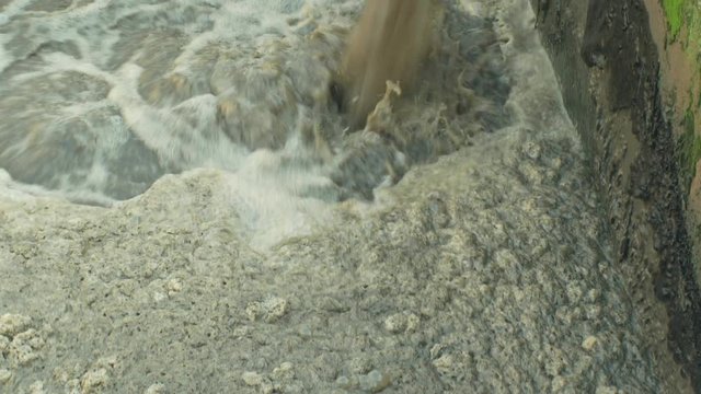 Discharge of waste water into segment clarifier biological purification of water sewage treatment plant, bubbles tank, activated sludge wastewaters process aeration and biology floc composed bacteria