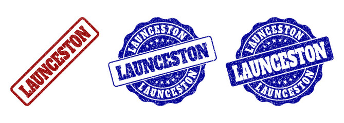 LAUNCESTON grunge stamp seals in red and blue colors. Vector LAUNCESTON marks with grunge style. Graphic elements are rounded rectangles, rosettes, circles and text tags.