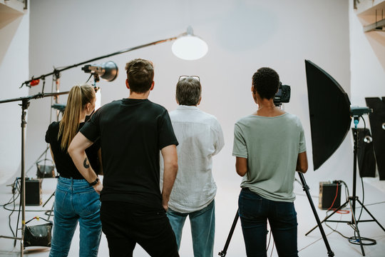 Production Team Working Together In A Studio