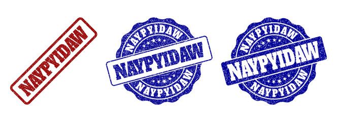 NAYPYIDAW grunge stamp seals in red and blue colors. Vector NAYPYIDAW imprints with grunge effect. Graphic elements are rounded rectangles, rosettes, circles and text tags.