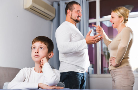 Upset son suffering from parents arguing