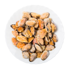 Obraz premium Frozen mussels on a white plate, isolated on white background
