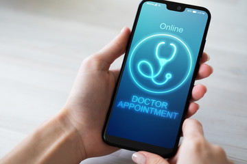 Online Doctor appointment on mobile phone screen. Medical and health care concept.