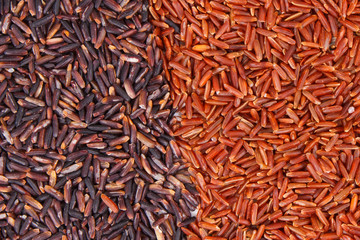 Heap of black and red rice as background, healthy, gluten free nutrition concept