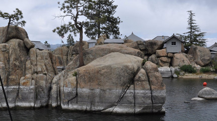 Boulders in the lake - Water level Marks staining the Rocks 