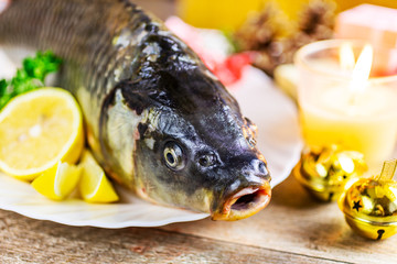 Czech christmas time and customs - bohemian cuisine and typical fish - traditional carp prepared...