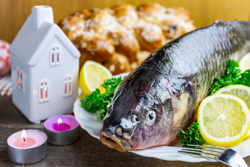 Czech christmas time and customs - bohemian cuisine and typical fish - traditional carp prepared for festive dinner cooking