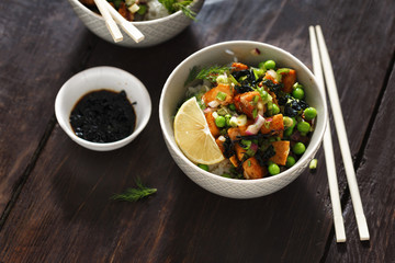 Vegetarian poke bowl on wooden table