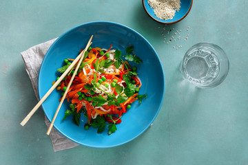 Vegetarian Thai noodles stone background copy space top view