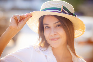 portrait headshot of beautiful asian younger woman toothy smiling face happiness emotion