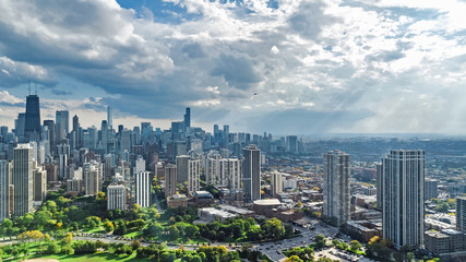 Fototapeta premium Chicago skyline aerial drone view from above, lake Michigan and city of Chicago downtown skyscrapers cityscape from Lincoln park, Illinois, USA 