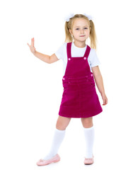 Naklejka premium Little girl posing in studio on a white background.
