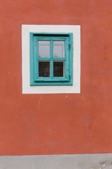 Window on a red brick wall with vintage tone