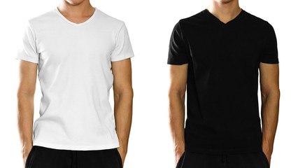 A man in an empty clean white and black t-shirt. Front view. Isolated on white background