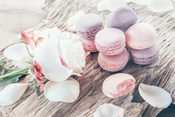 Freshly baked multi-colored macaroons close-up, selective focus