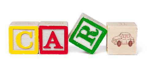 Colorful alphabet blocks. Word car isolated on white background