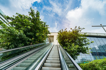 ascending escalator in a public transport area