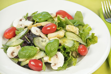 fresh salad on white plate