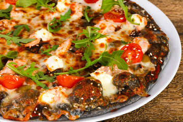 Pizza with salmon and mozzarella