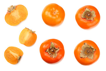fresh ripe persimmons with slices isolated on white background. top view