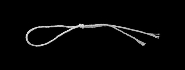 White strings, rope isolated on black background texture, top view