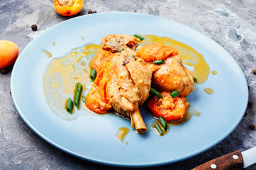 Chicken meat in apricot sauce
