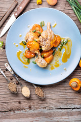Chicken meat in apricot sauce
