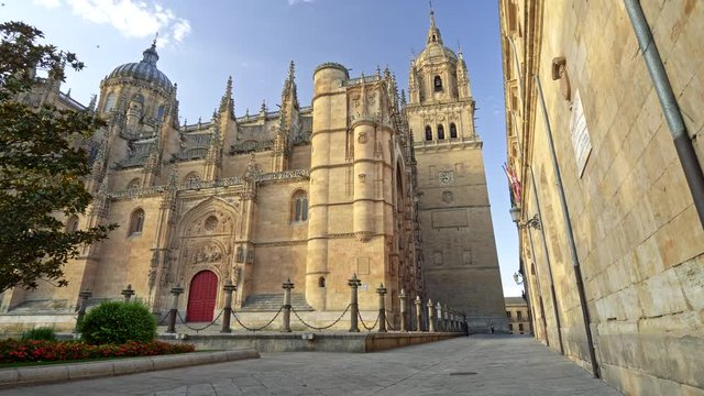 Salamanca, Spain. Old Cathedral of Salamanca located in the community of Castile and Leon. The cathedral was built in Romanesque Gothic style and was founded in 12th century. Shot from below, 4K