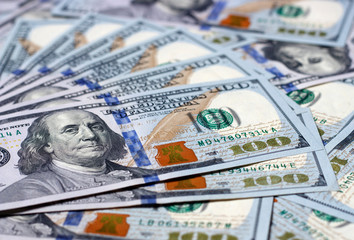 American hundred dollar bills close-up, money background