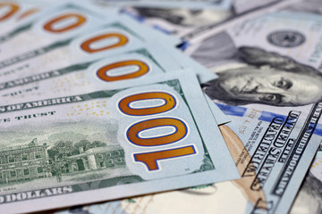 American hundred dollar bills close-up, money background