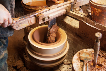 Old factory pottery production, making pots 