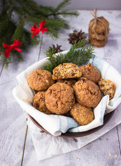 homemade oatmeal cookies on a wooden grey table free space for text - holidays, winter, celebration,  Christmas and  new year concept 