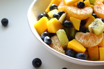 Fresh fruit and berries salad . Healthy vitamin food background.