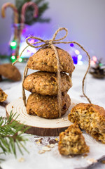 Fototapeta na wymiar homemade oatmeal cookies on a wooden grey table free space for text - holidays, winter, celebration, Christmas and new year concept 