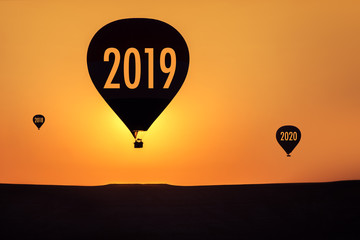 2019 concept and hot air balloon early in the morning