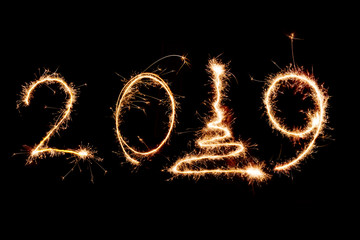 2019 written with Sparkle firework on black background, happy new year 2019 concept