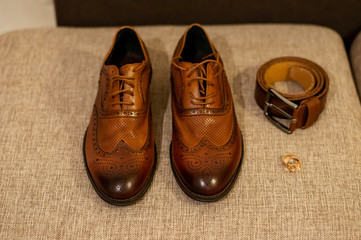 Wedding rings shoes of the groom