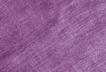Linen cloth texture in purple color.