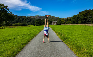 handstand on the road