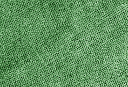 Linen cloth texture in green color.