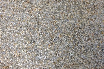 Close up colorful pebbles concrete background