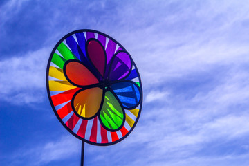 Rainbow lgbt pride spinning pinwheel. Symbol of sexual minorities, gays.