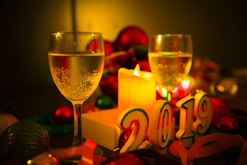 Glasses of champagne and new year decorations